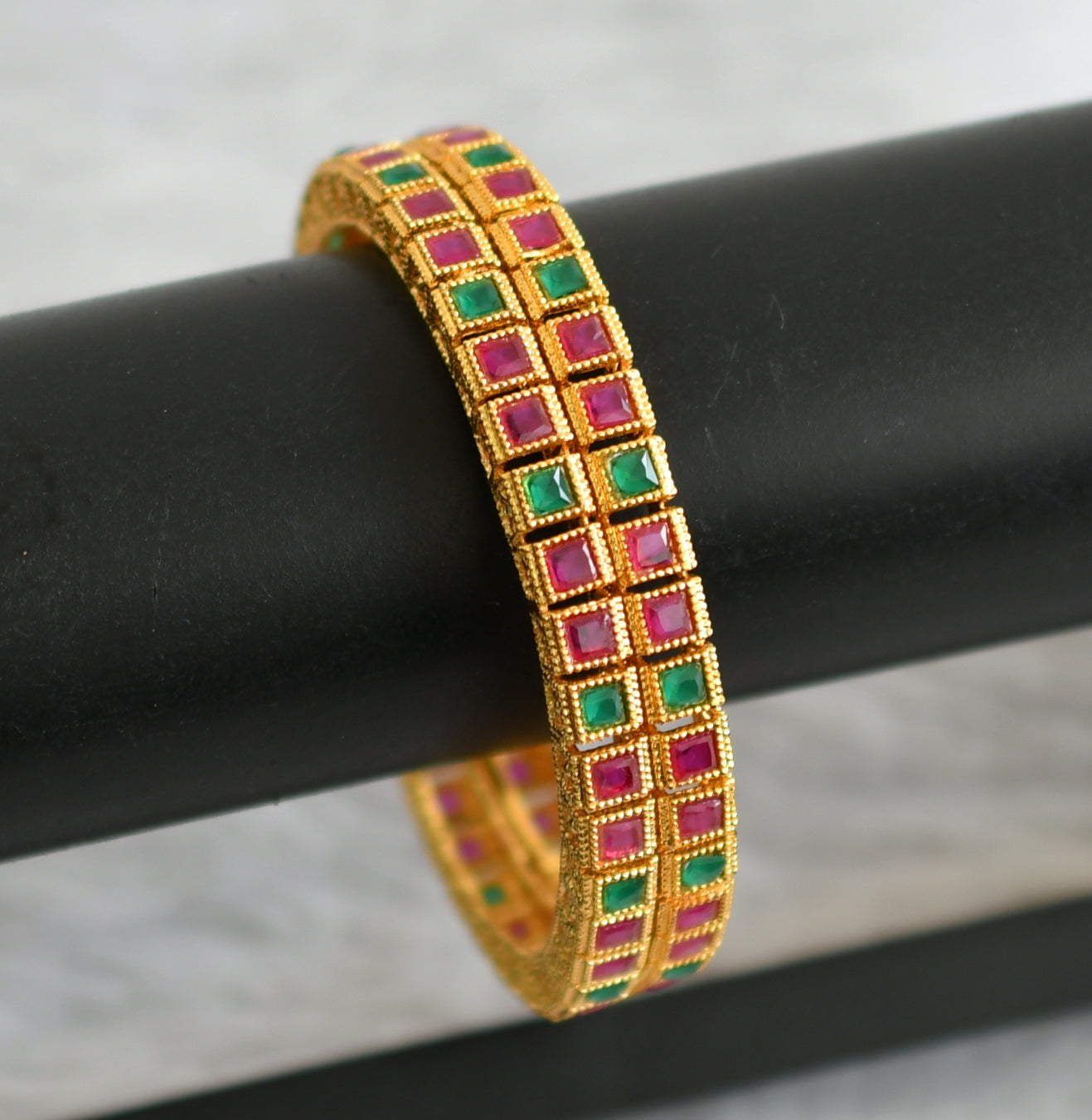 Gold tone ruby-green block stone bangles(2.6) dj-47882