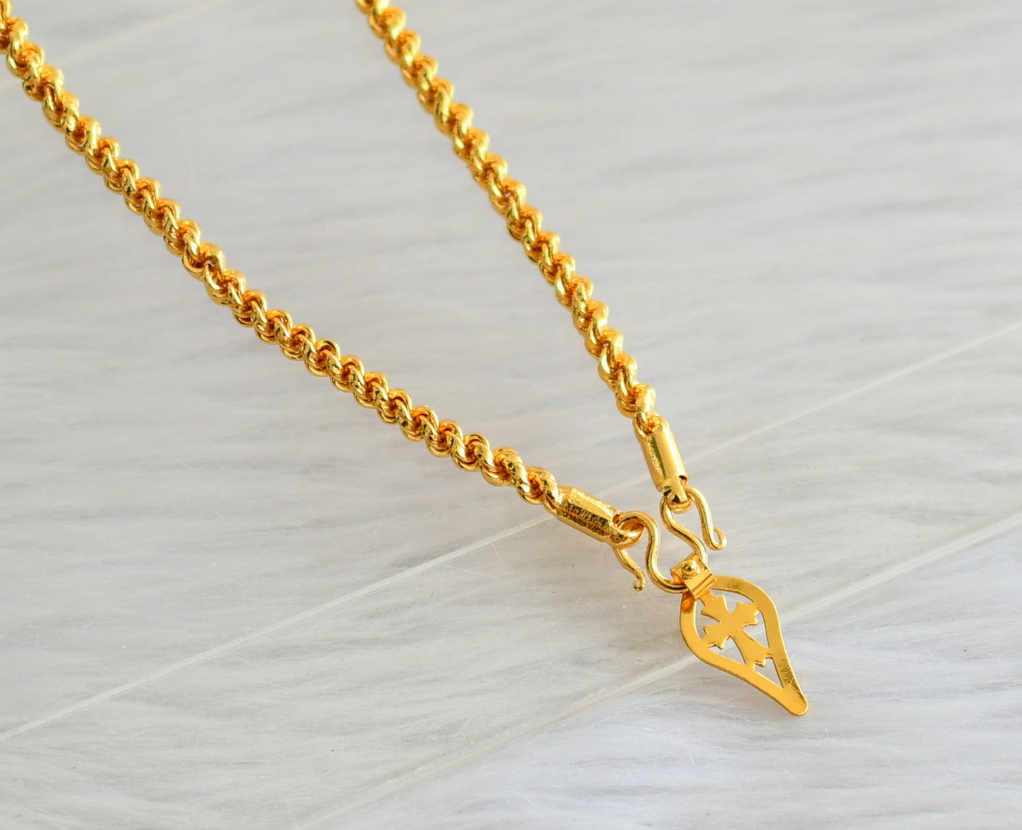 Gold tone Kerala style cross in elakka shape pendant with 24 inches chain dj-35052