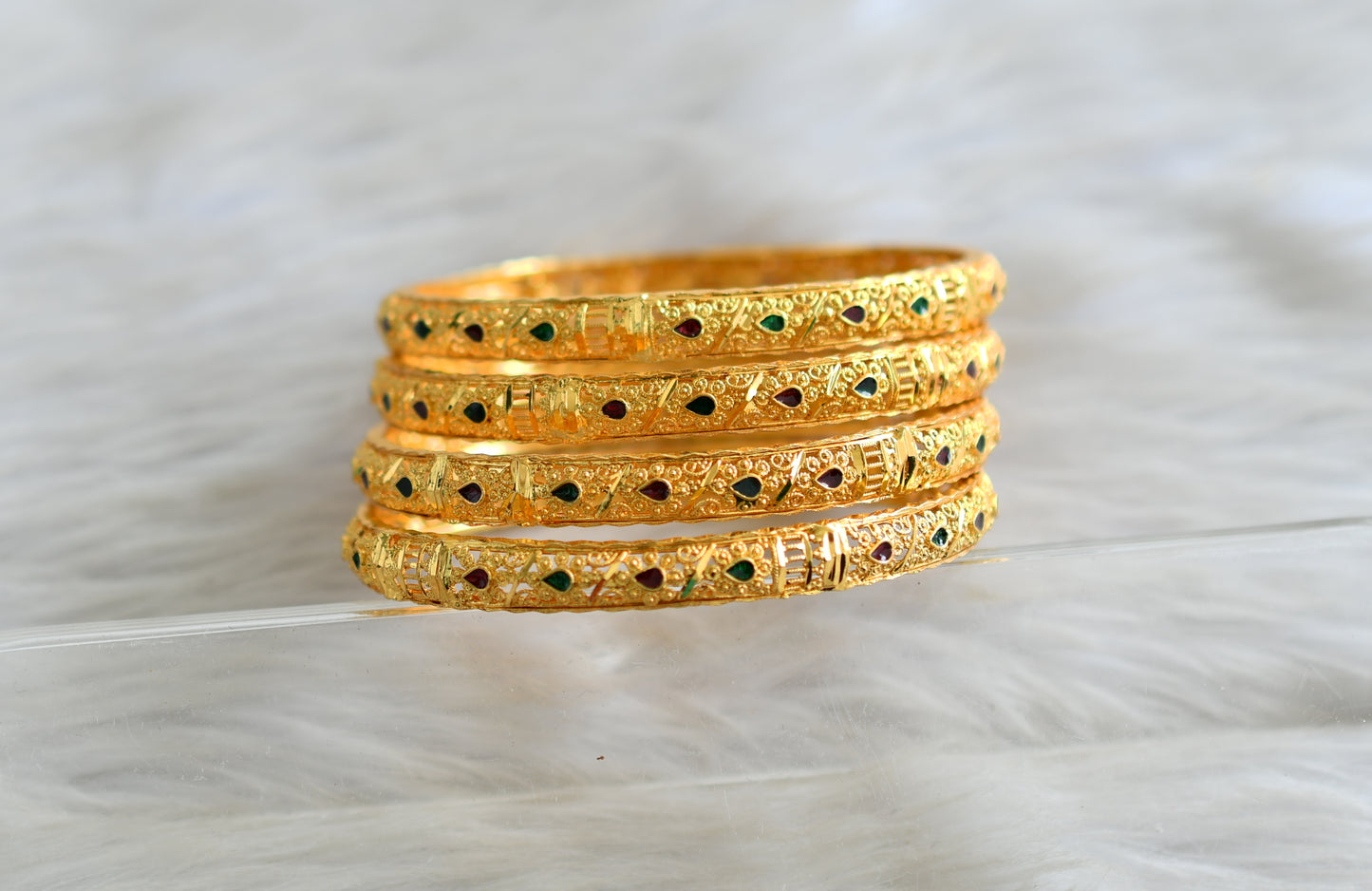 Gold tone Set of 4 designer bangles (2.8) dj-43030