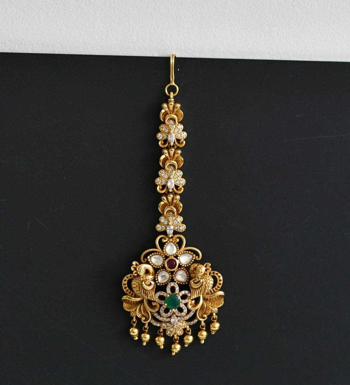 Antique gold tone cz-ruby-green peacock nakshi tikka dj-49832