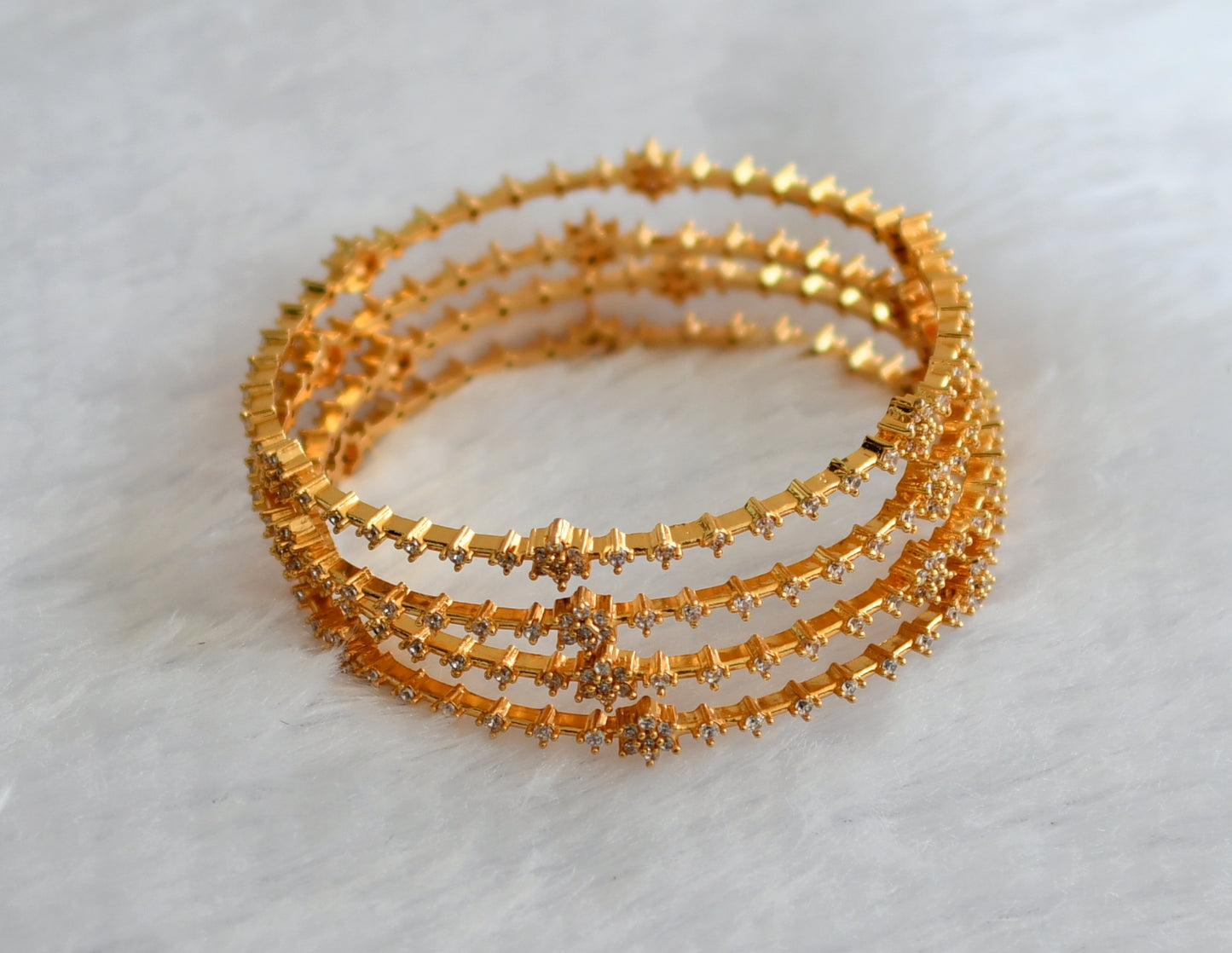 Gold Tone Cz White Set Of 4  nakshatra  Bangles(2.6) dj-27656