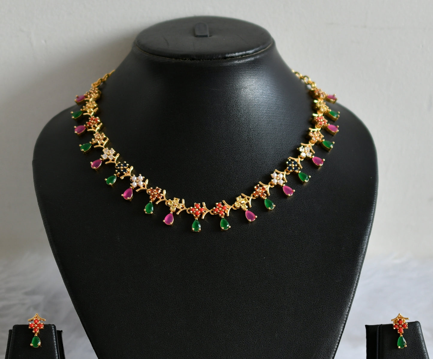 Gold tone ruby-green navarathna flower necklace set dj-49870