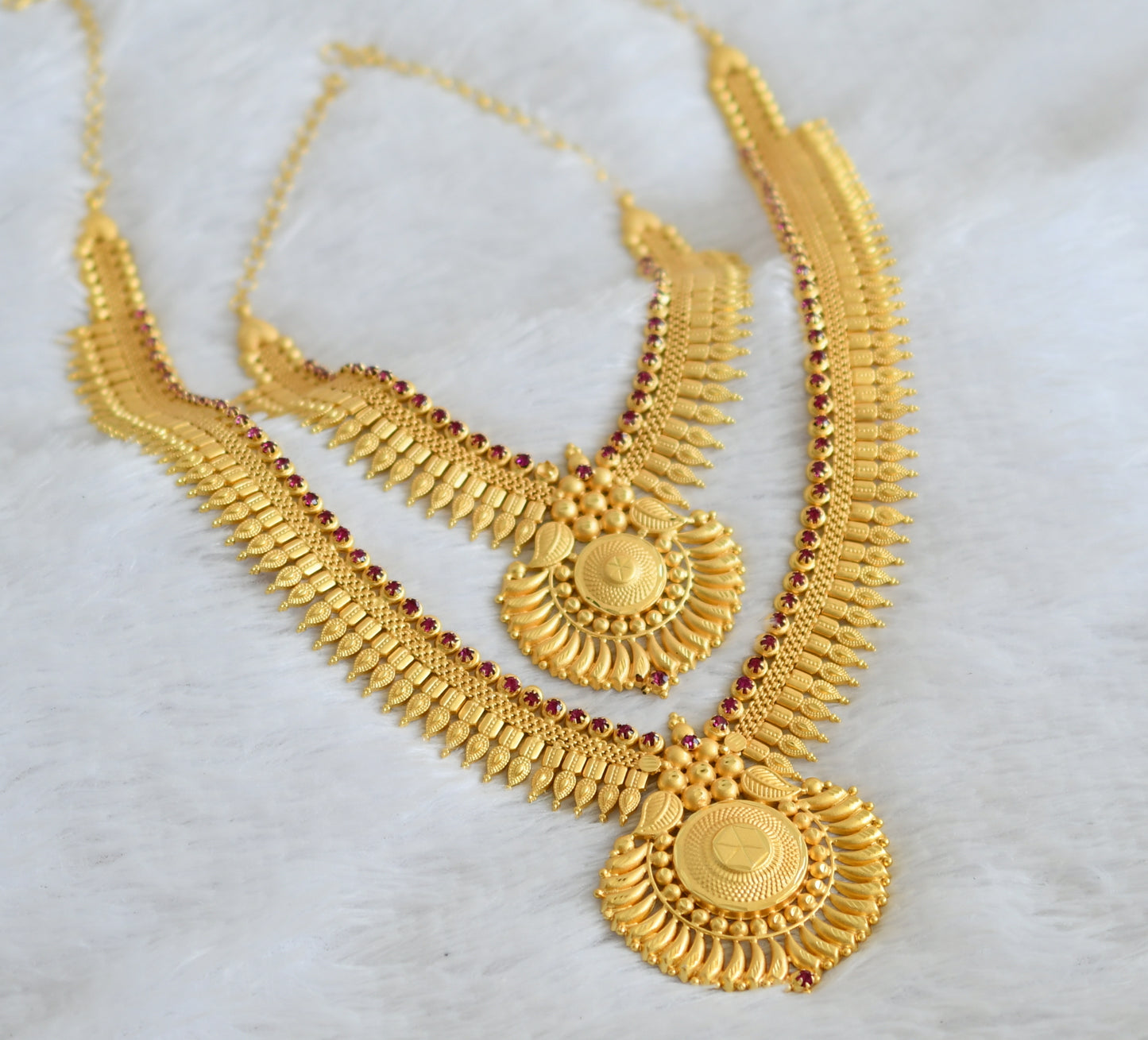 Matte gold tone kerala style pink stone combo haar set dj-49889