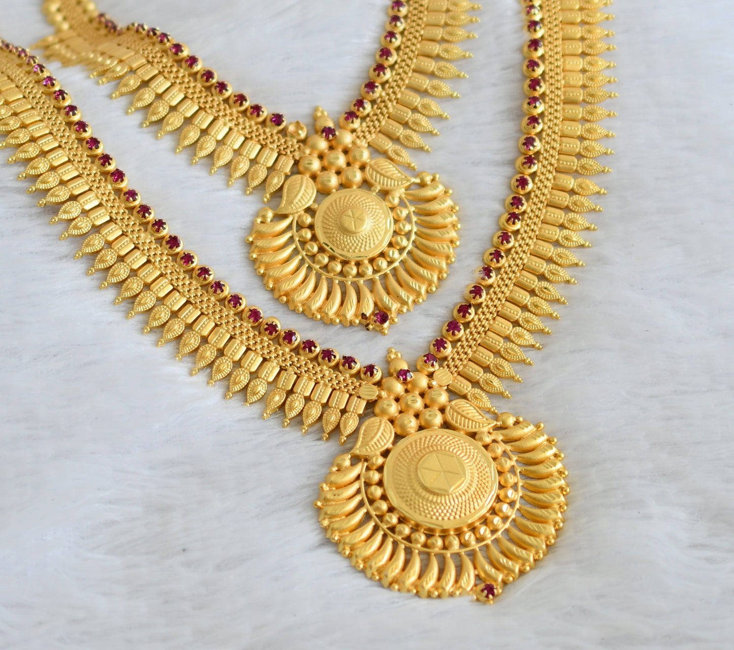 Matte gold tone kerala style pink stone combo haar set dj-49889