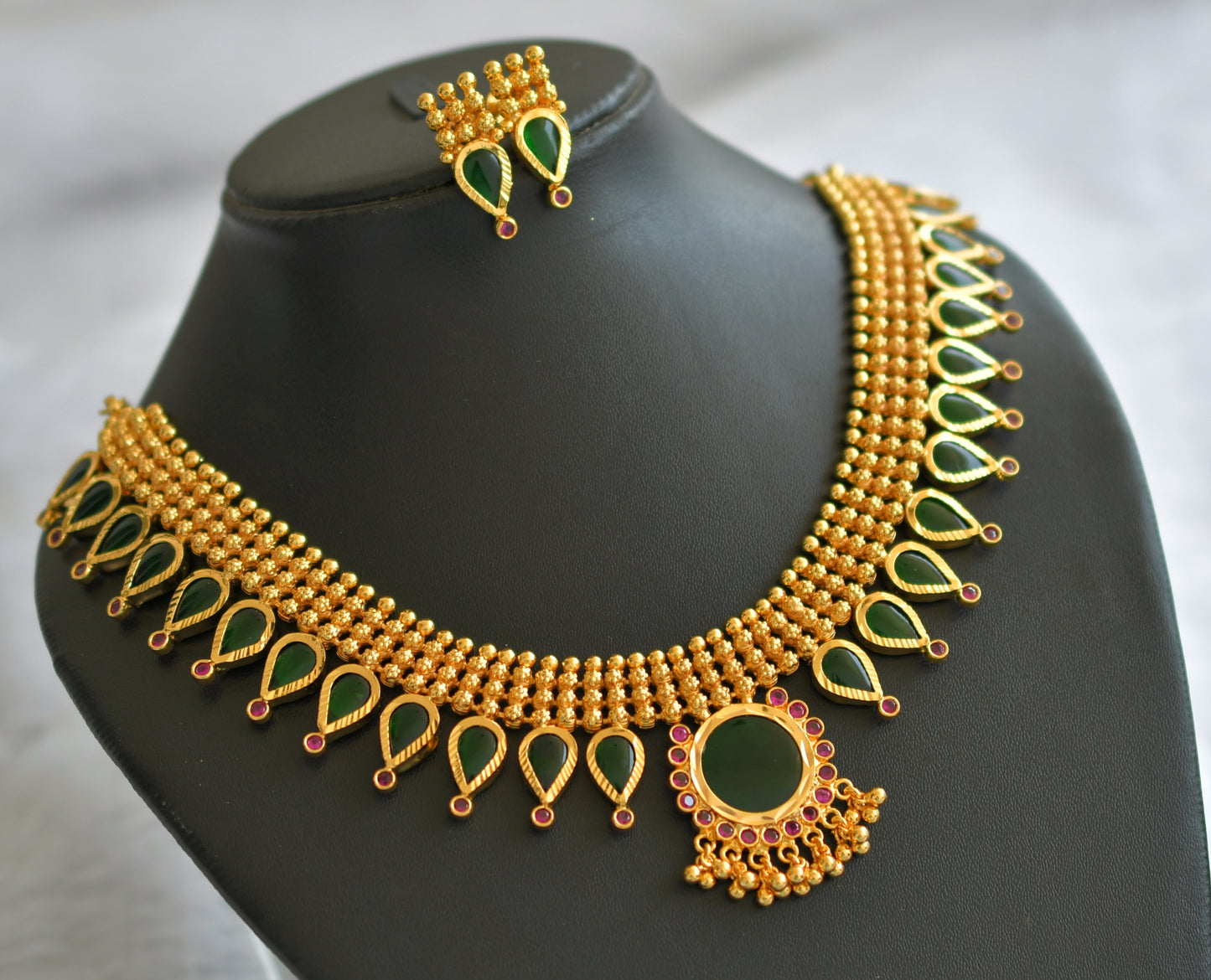 Gold tone ad pink-green kerala style gopi necklace set dj-46370