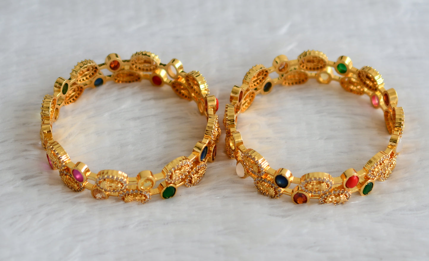 Gold tone cz-navarthna oval stone lakshmi set of 4 bangles(2.6) dj-49964