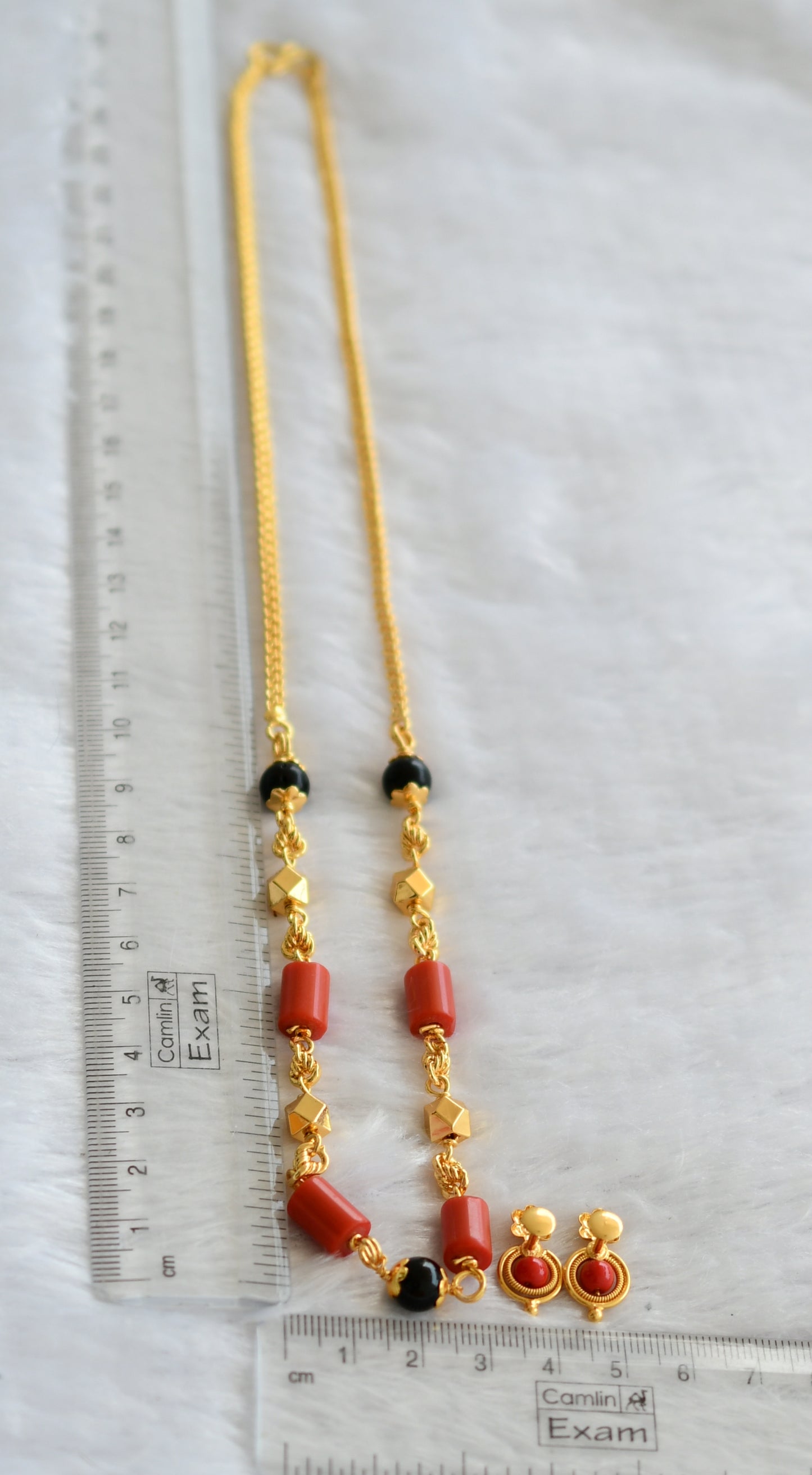 Gold tone coral-black beaded necklace set dj-46400