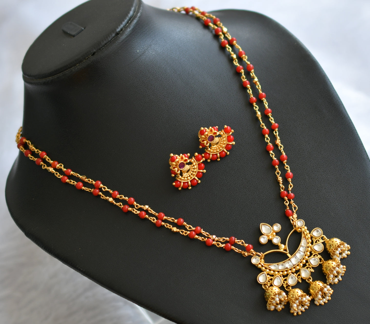 Gold tone coral white kundan jadau necklace set dj-46396