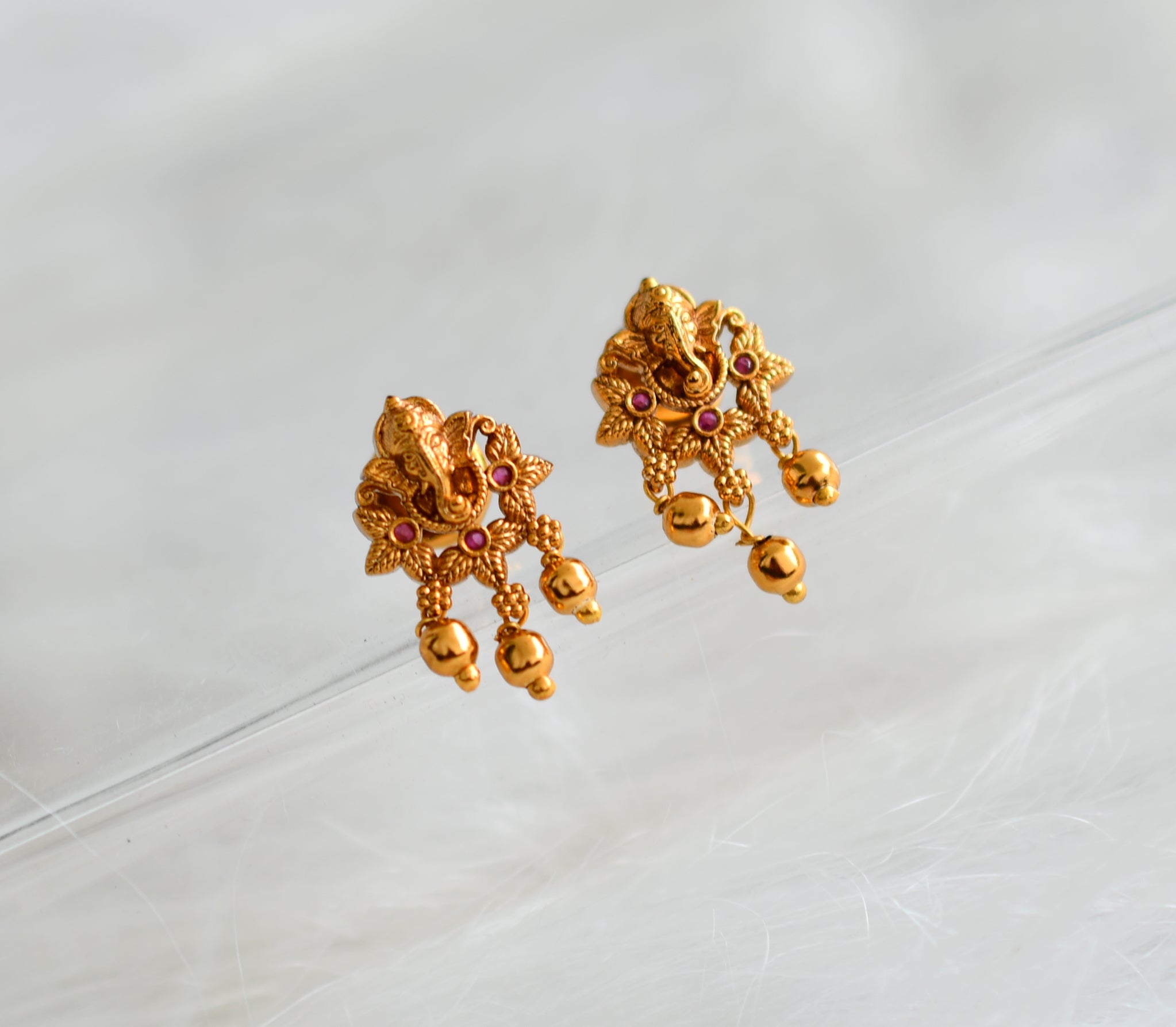 Matte gold stud on sale earrings