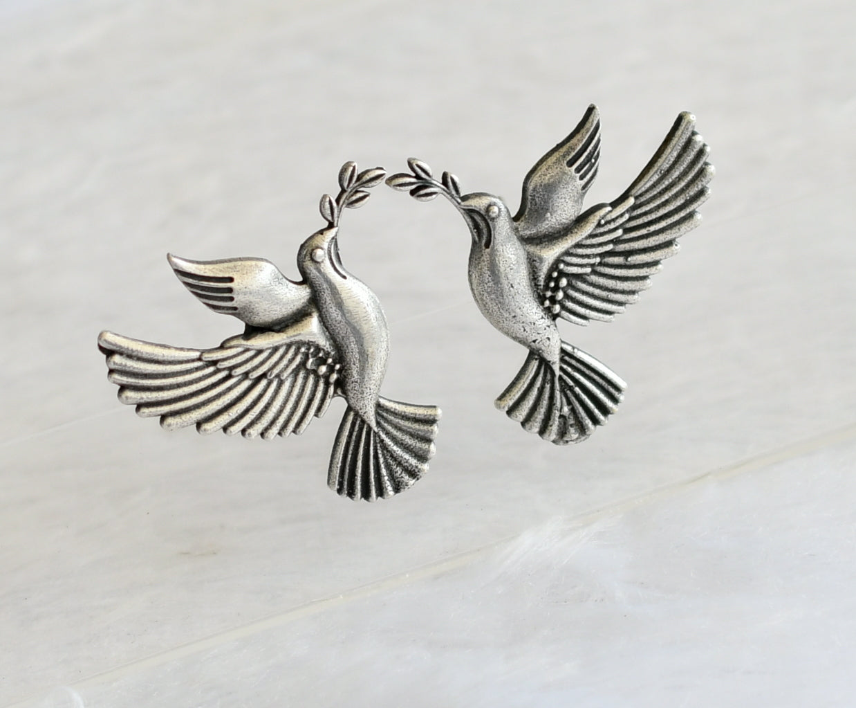 silver tone bird earrings dj-46416