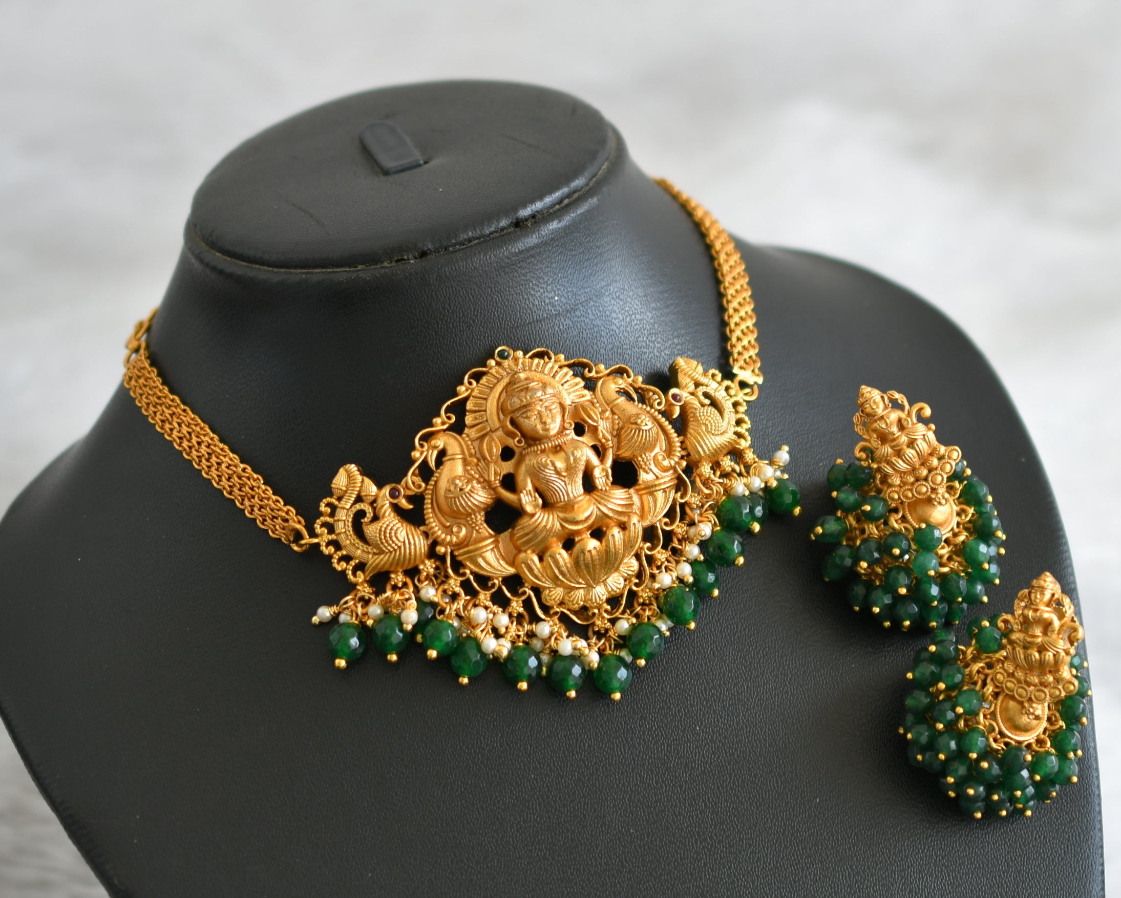Matte finish pearl-green beaded lakshmi peacock choker necklace