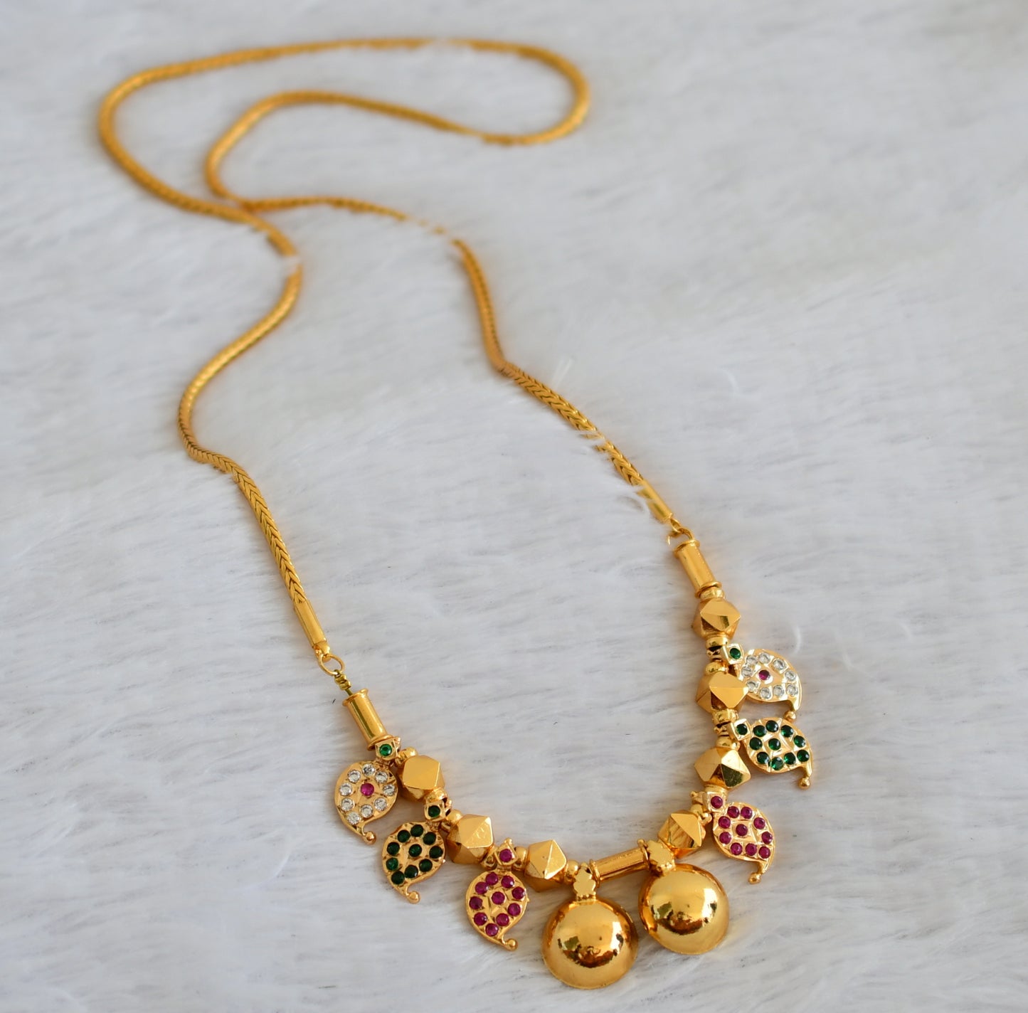 Gold tone 24 inches kodi chain with pink-green-white stone mango bottu mangalyam dj-49681