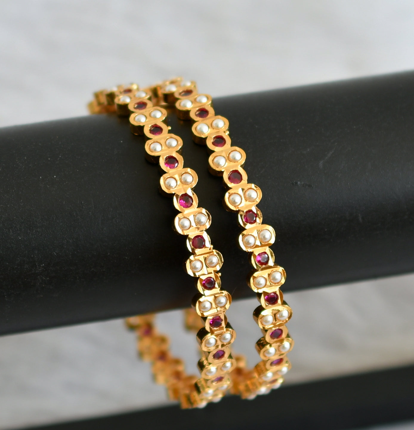 Gold tone ad pink-pearl south indian bangles(2.6) dj-48046