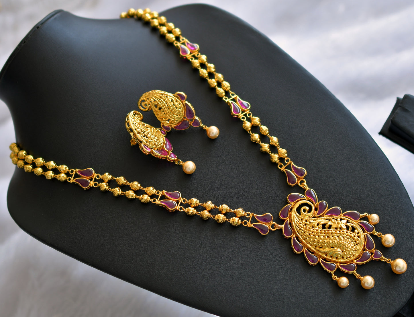 Gold tone pink stone uncut polki mango sort haar set dj-46495