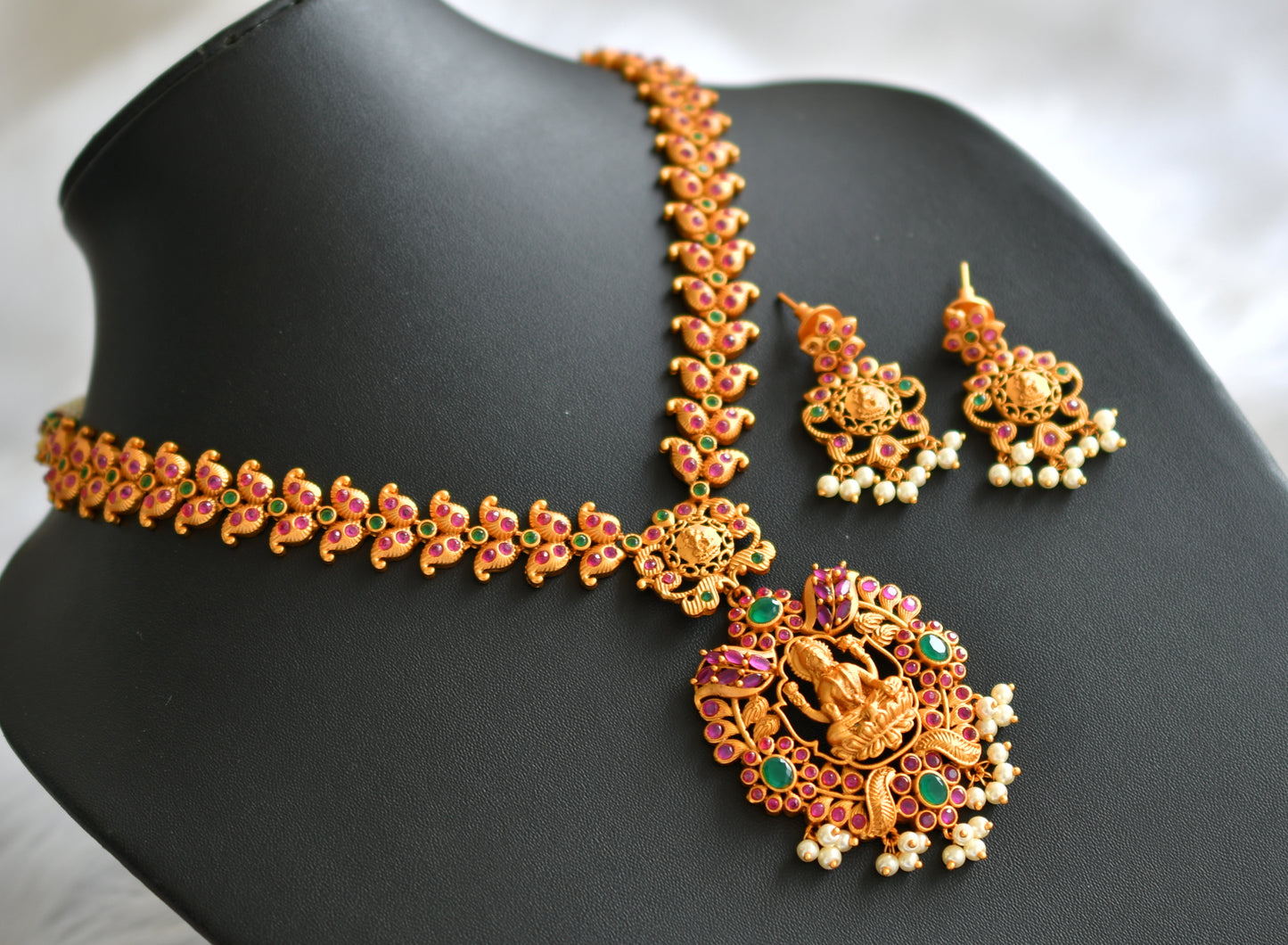 Matte finish ruby-emerald lakshmi mango necklace set dj-14646