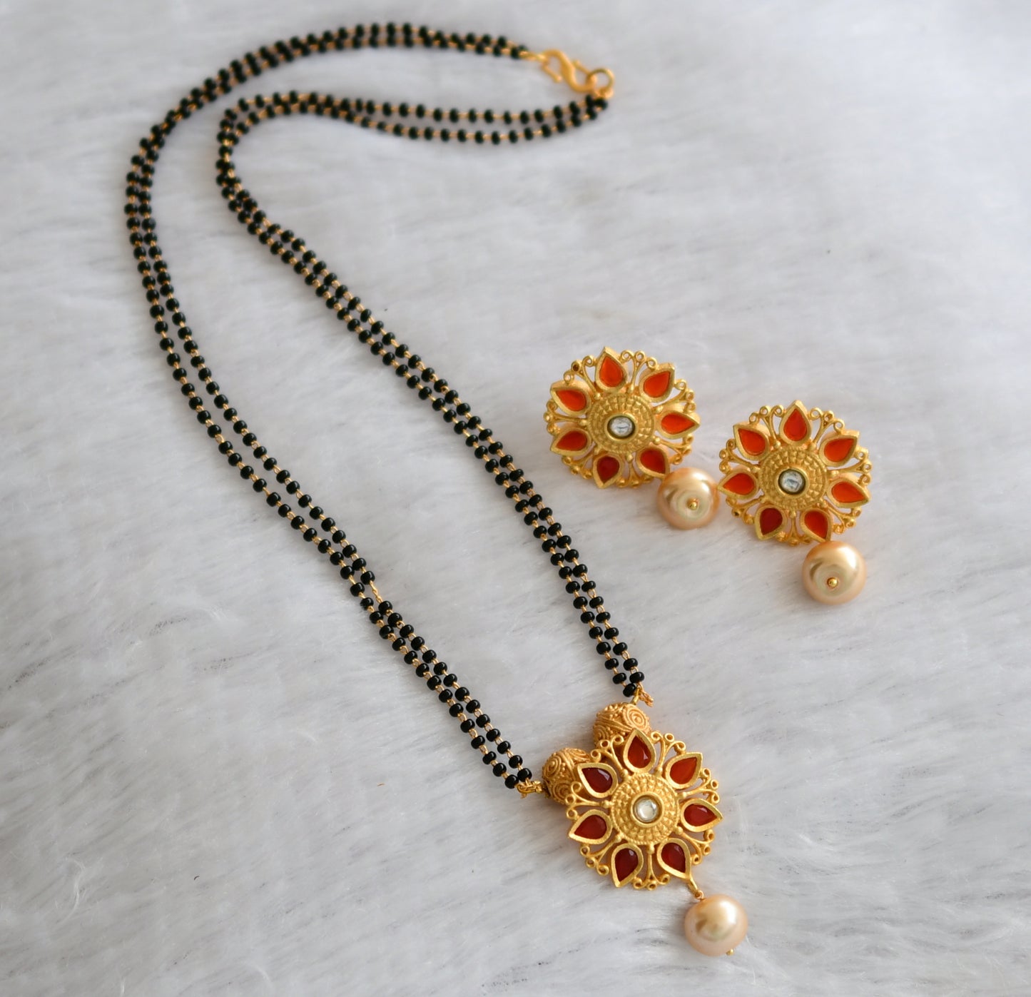 Matte finish orange-white flower mangalsutra set dj-46507