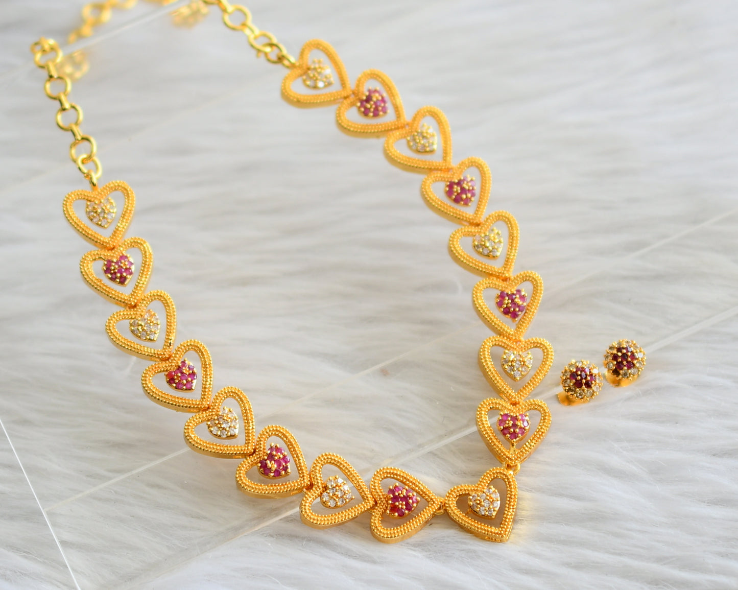 Gold tone ruby-white heart necklace set dj-44712