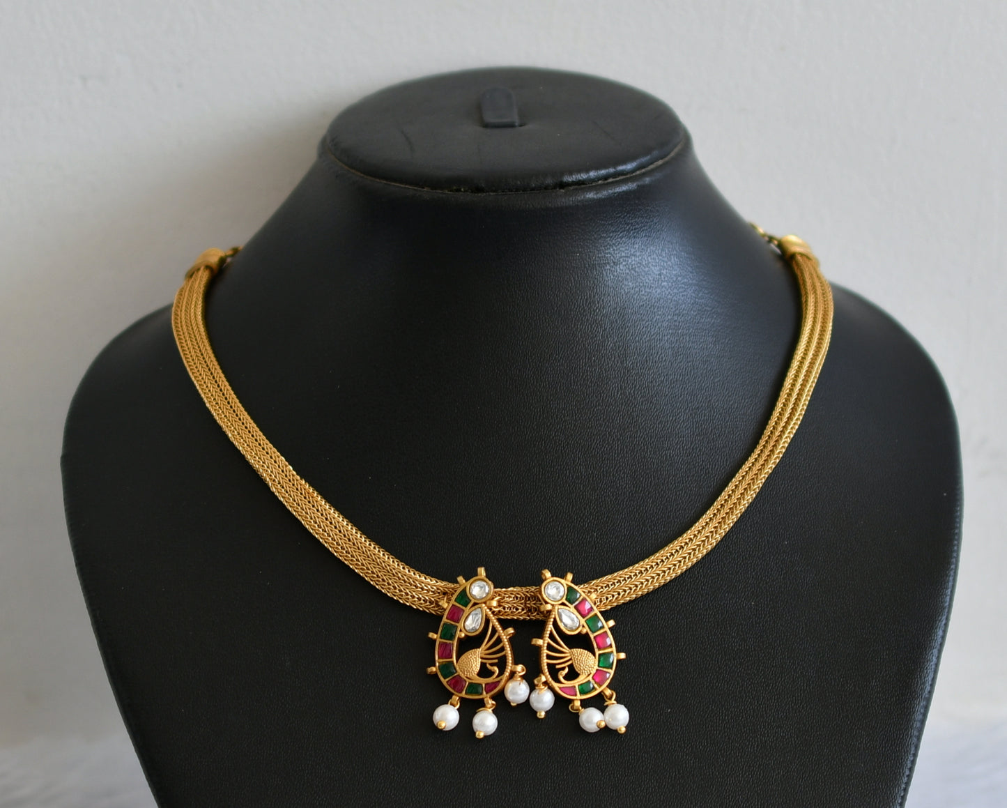 Matte finish ruby-green-white kundan jadau peacock necklace dj-50110
