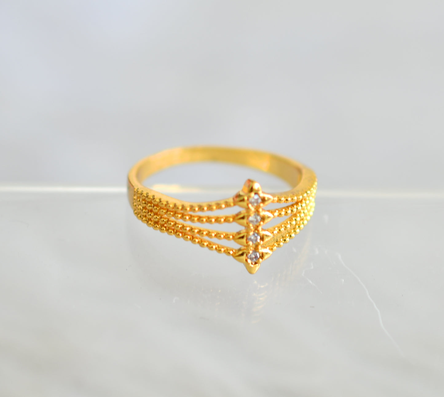 Gold tone cz white finger ring dj-43216