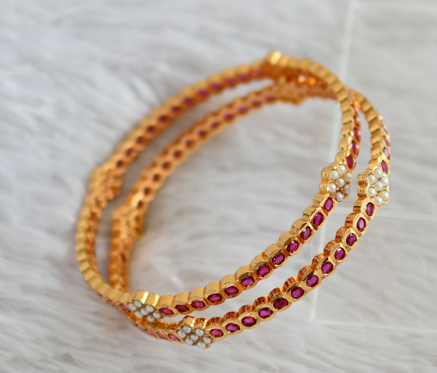 Gold tone ad pink-pearl south indian flower bangles(2.6) dj-48123