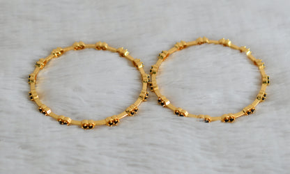 Gold tone black stone bangles(2.6) dj-48130