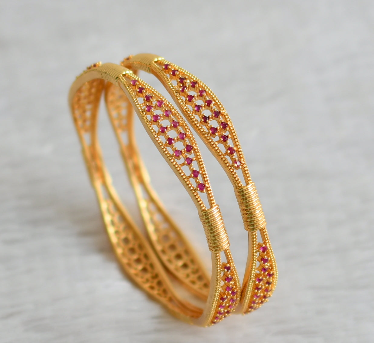 Gold tone ruby stone bangles(2.8) dj-48134