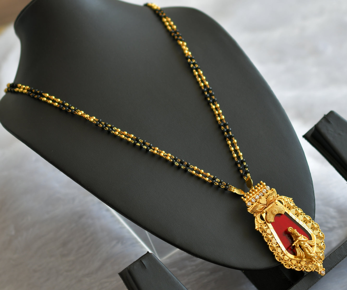 Gold tone kerala style karimani chain with white-red krishna nagapadam pendant with chain dj-46542