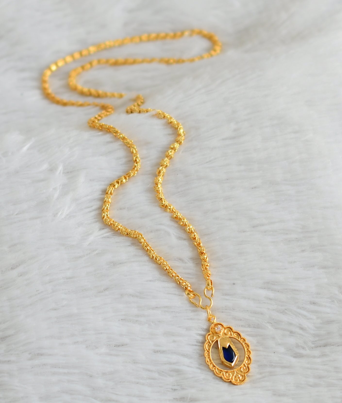 Gold tone 24 inches chain with blue nagapadam pendant dj-48253