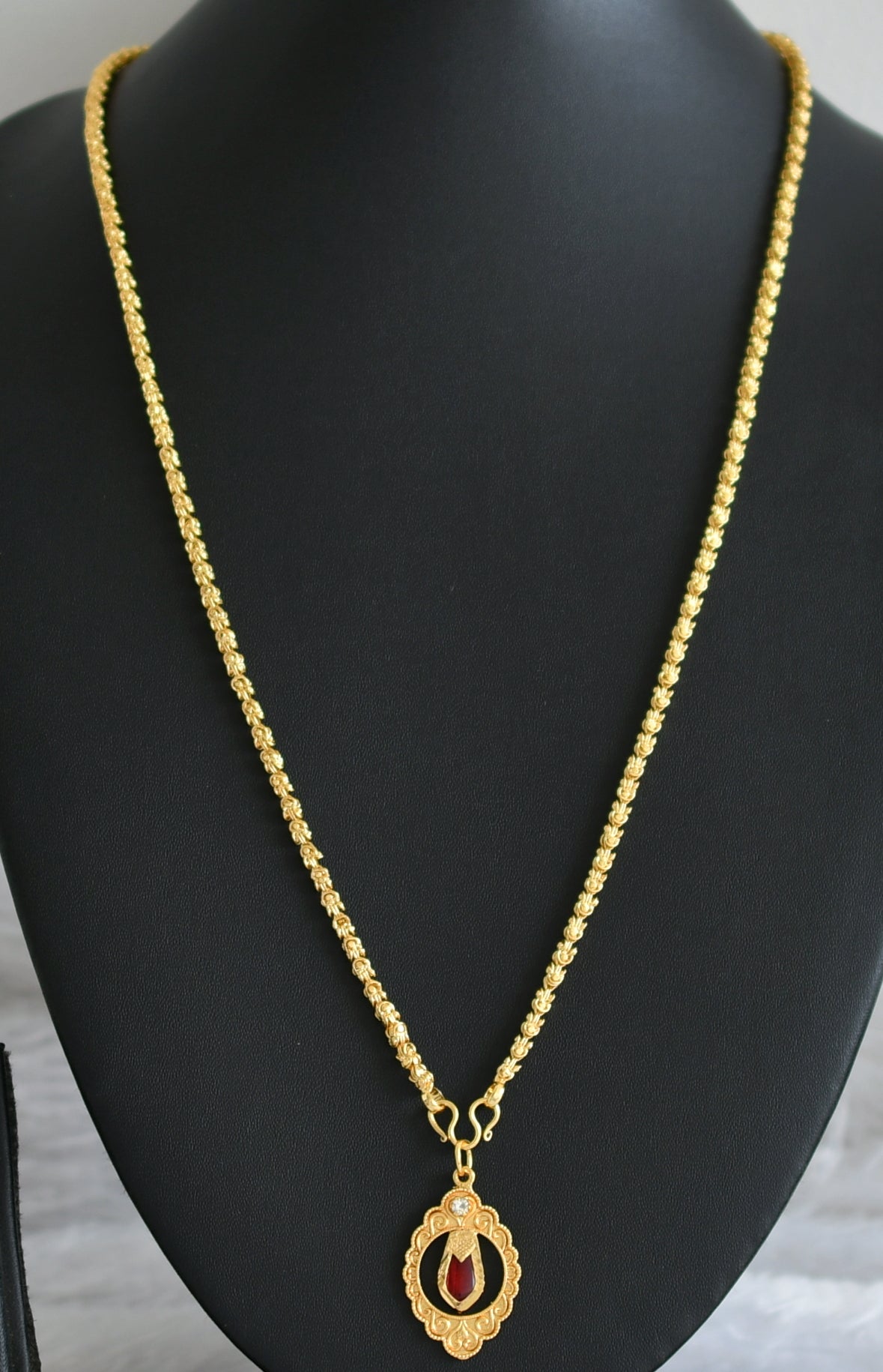 Gold tone 24 inches chain with red nagapadam pendant dj-48252