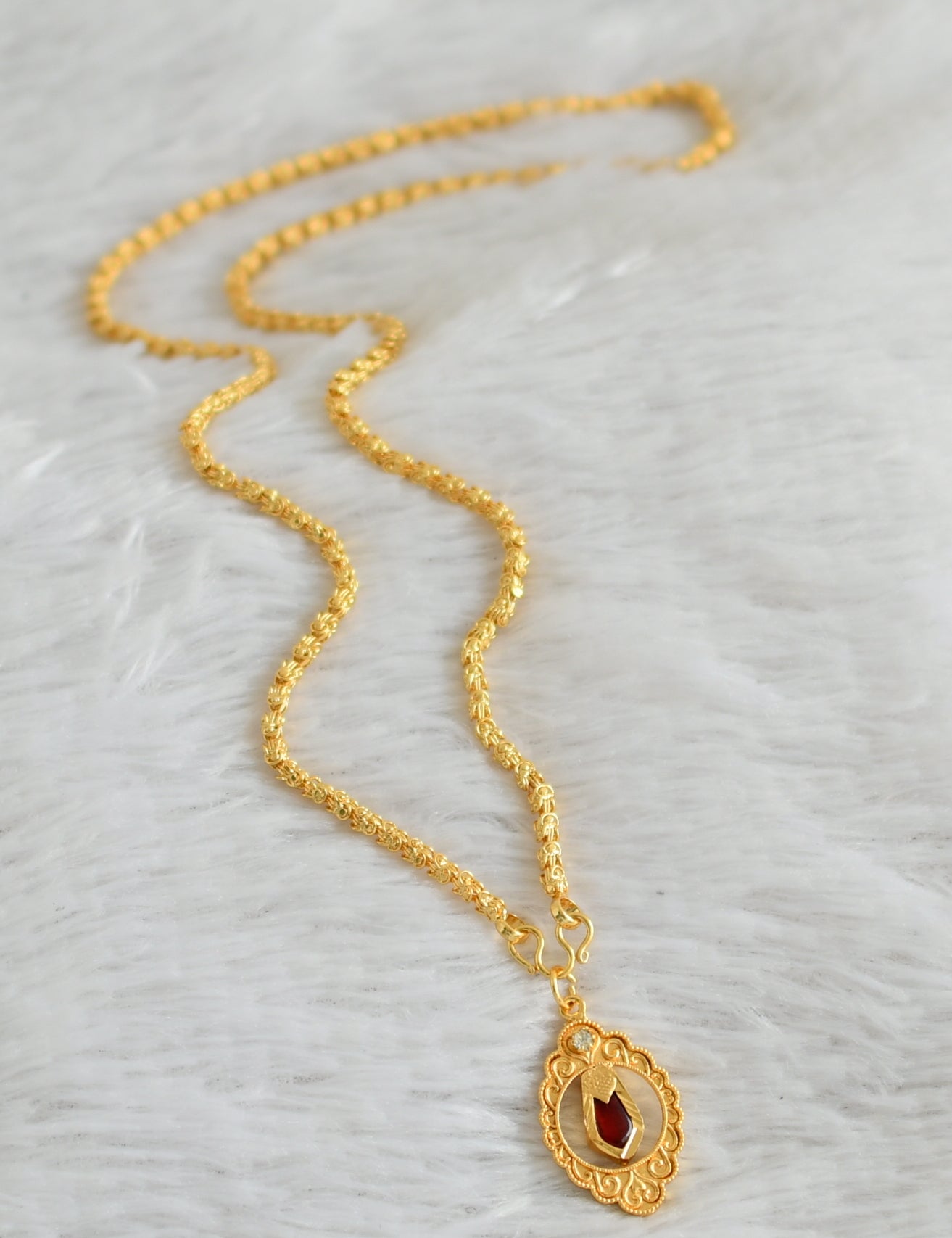 Gold tone 24 inches chain with red nagapadam pendant dj-48252