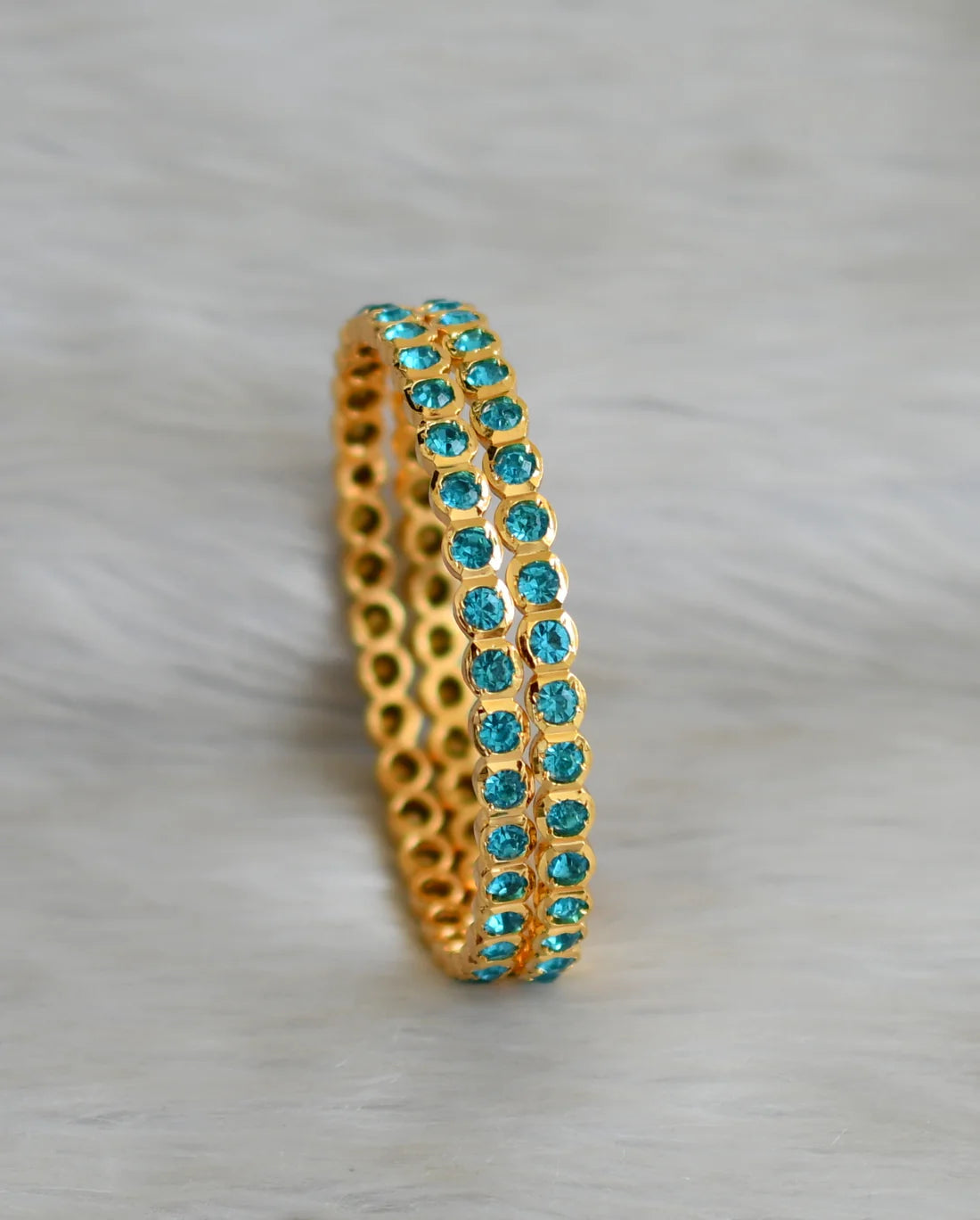 Gold tone sky blue stone south indian style bangles(2.10) dj-49682