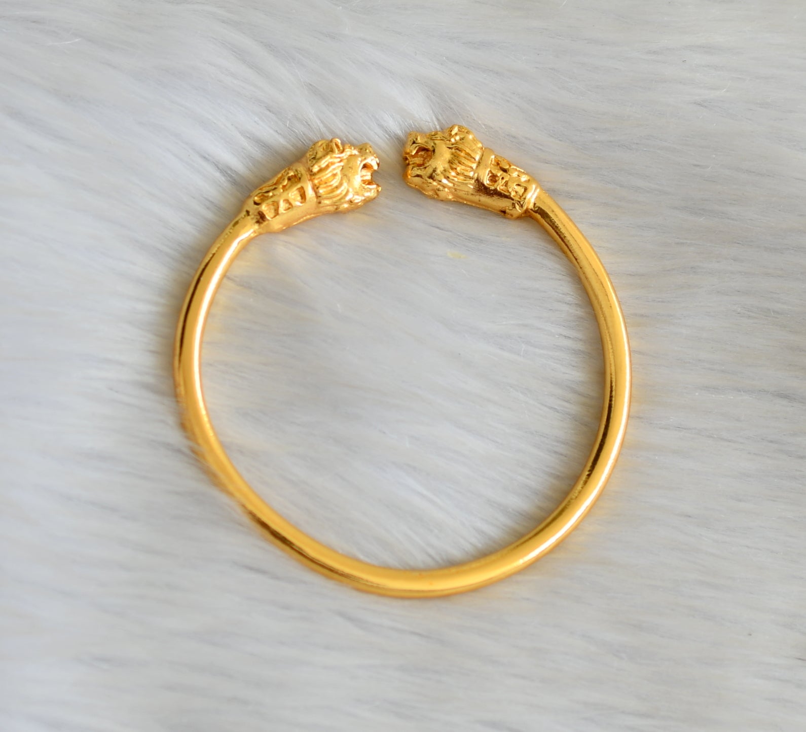 Lion face store gold kada