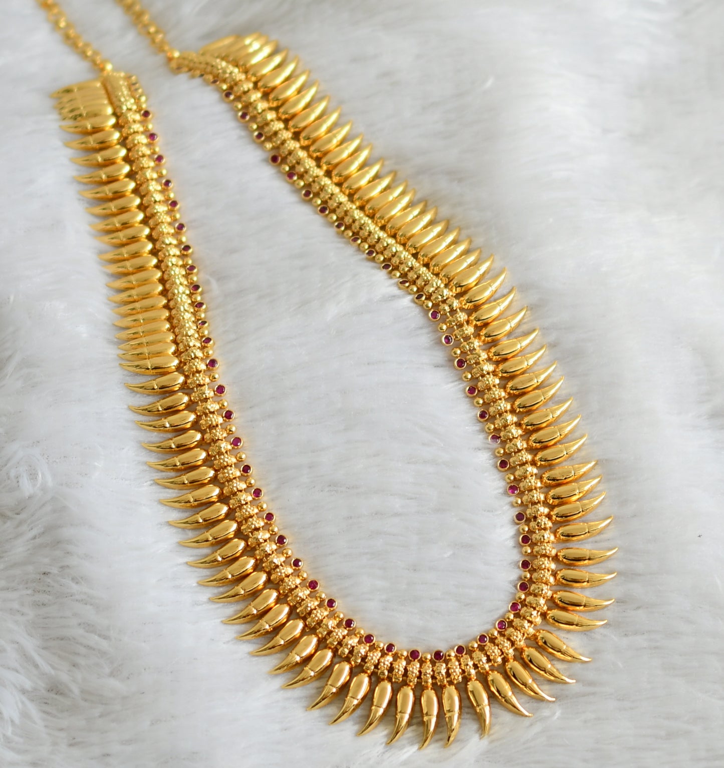 Gold look alike ad pink stone Pulinagam haar dj-48319