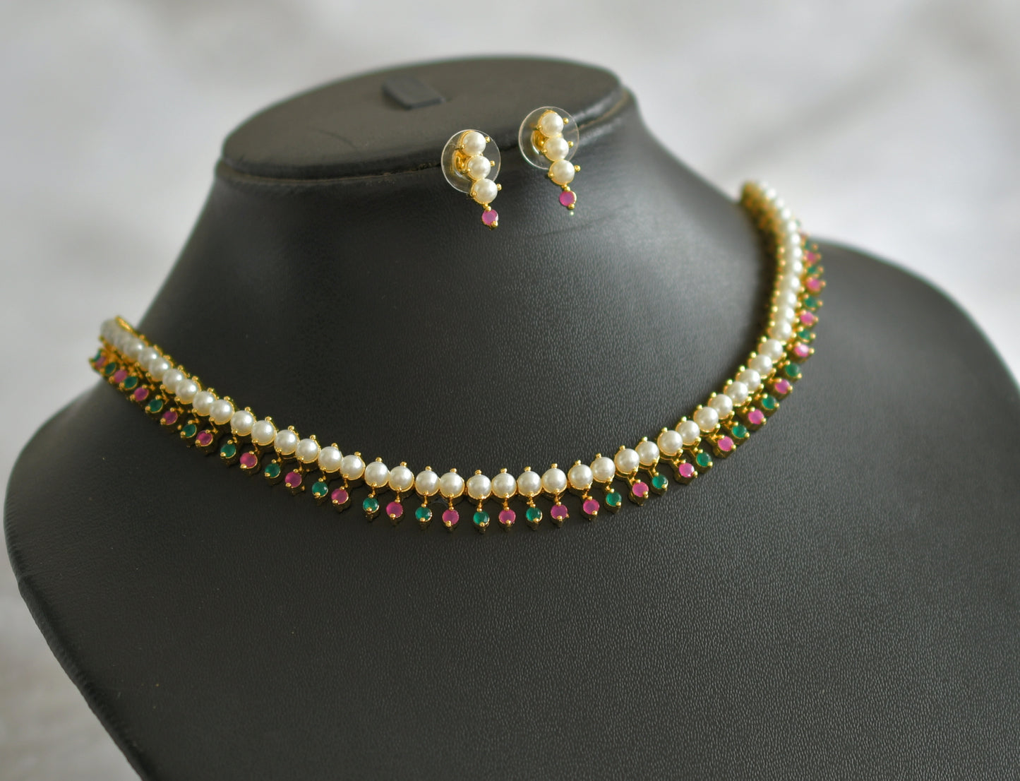 Gold tone ruby-green-pearl stone necklace set dj-46639