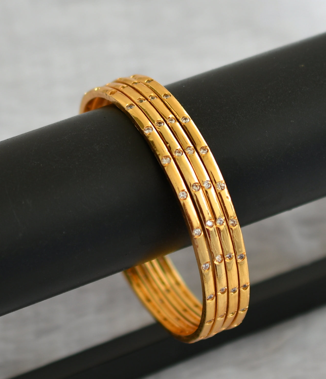 Gold tone white stone set of 4 Bangles(2.4) dj-40704