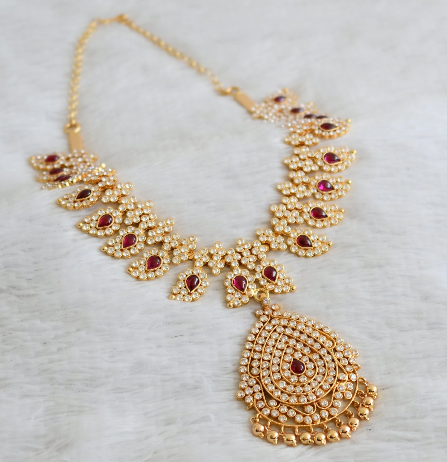 Gold tone ad real kemp-white stone mango necklace dj-50412