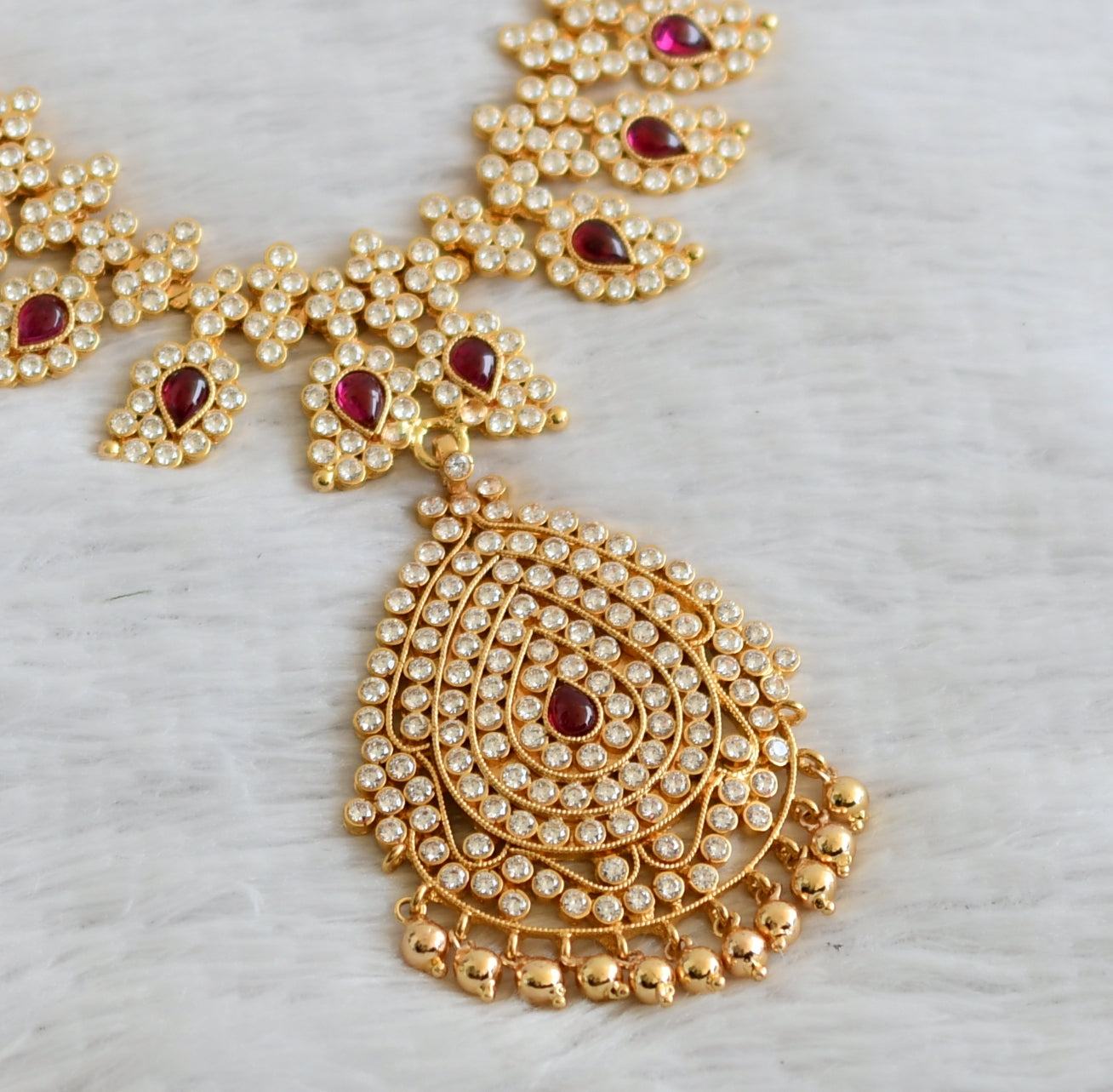 Gold tone ad real kemp-white stone mango necklace dj-50412