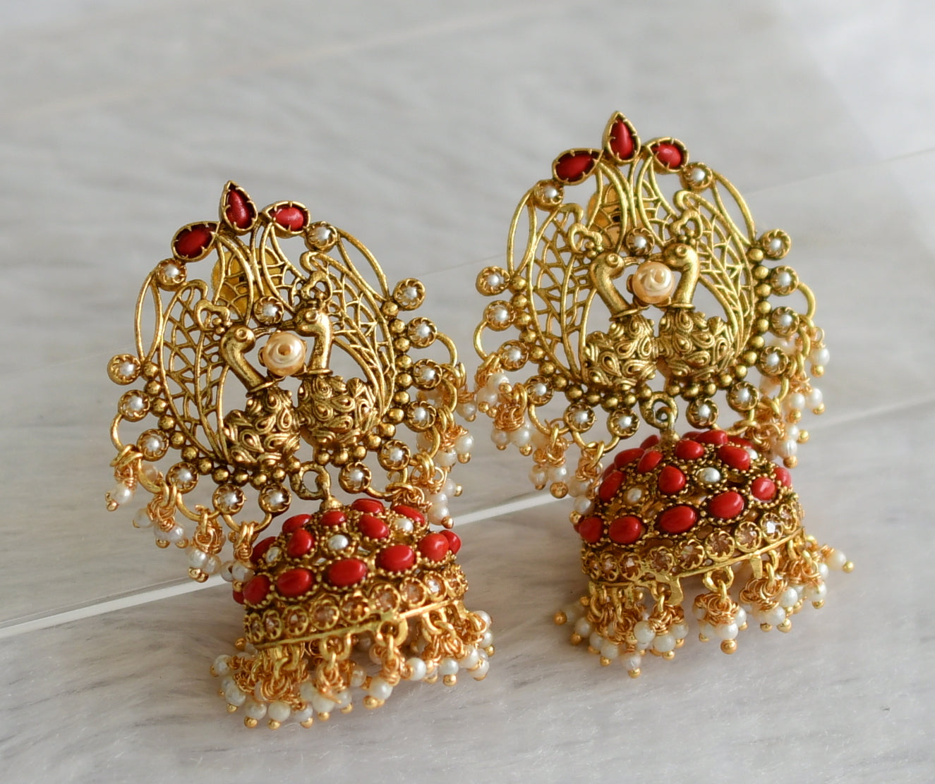 Gold tone coral-pearl cluster peacock jhumkka dj-46749