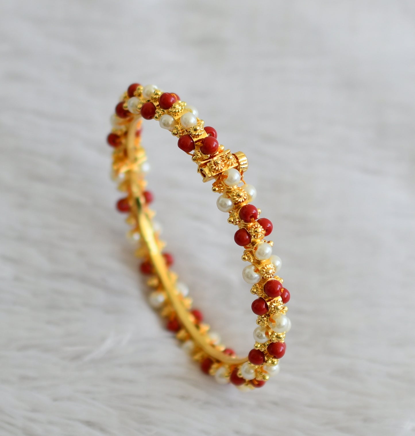 Gold tone coral-pearl lakshmi bangle dj-48529