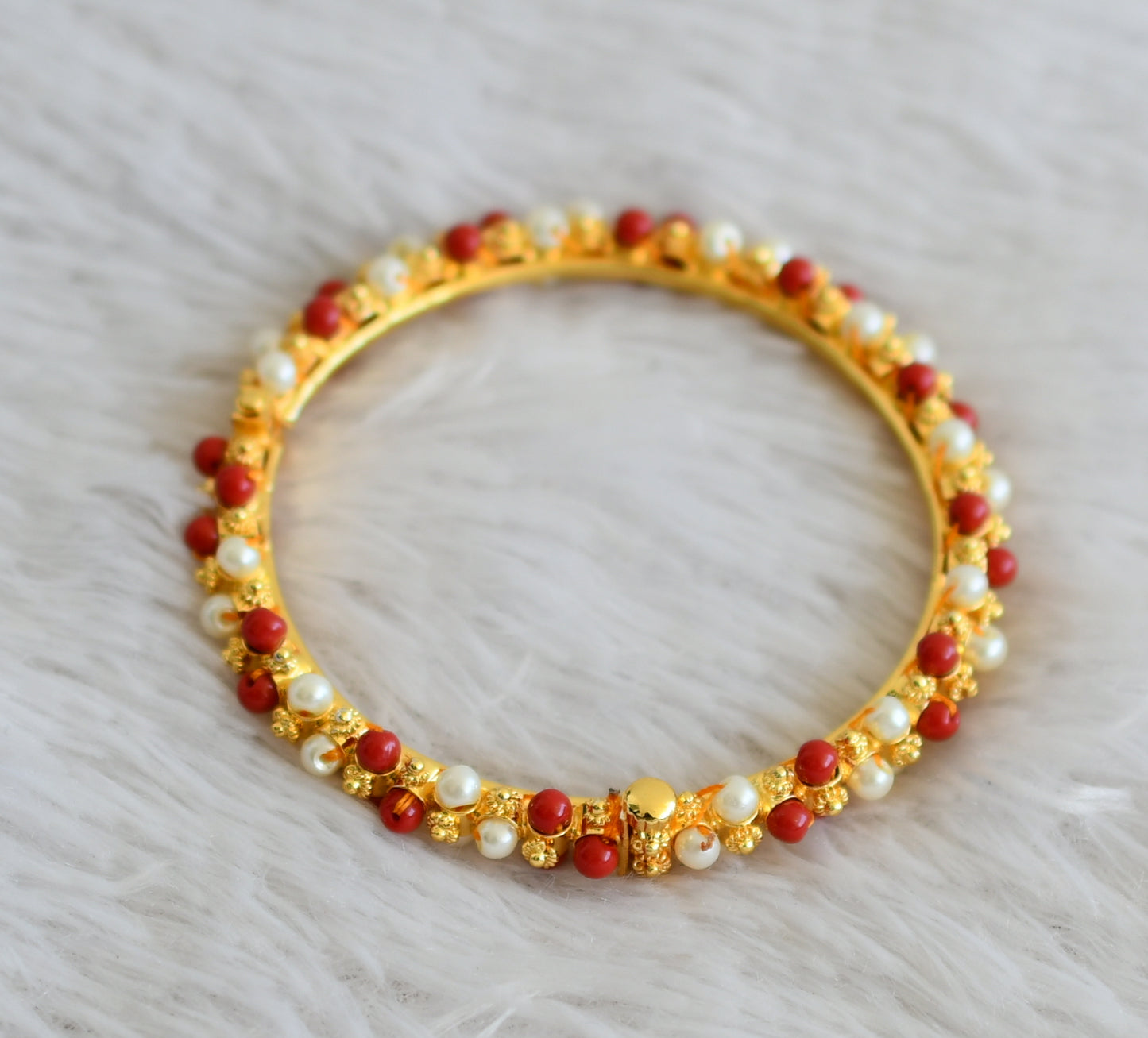 Gold tone coral-pearl lakshmi bangle dj-48529