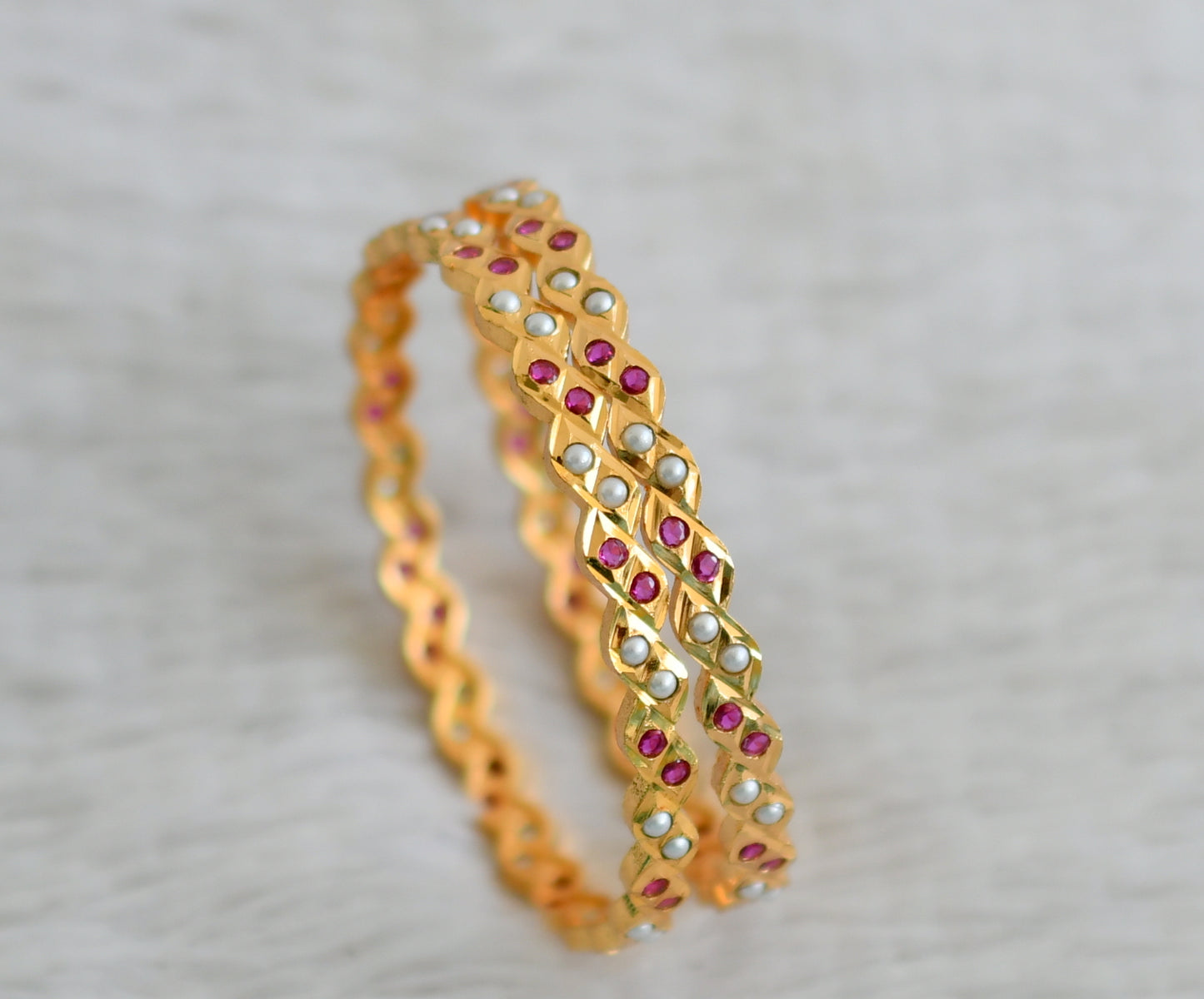 Gold tone ad pink-pearl south indian style bangles(2.8) dj-48580