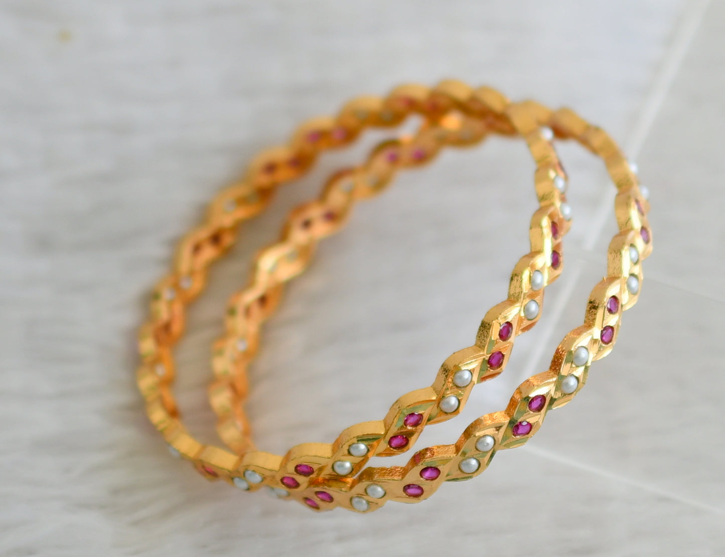 Gold tone ad pink-pearl south indian style bangles(2.4) dj-48578