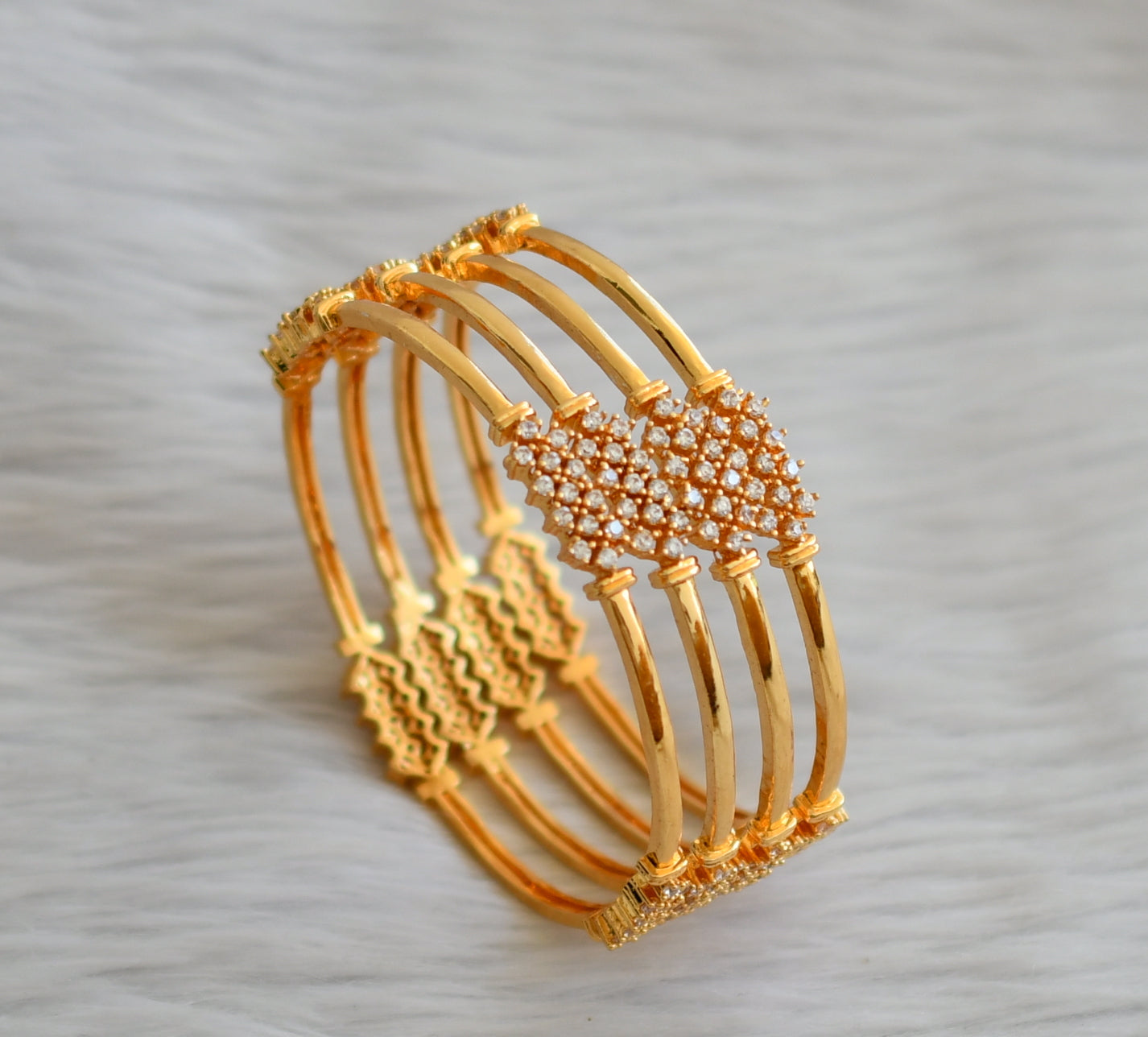 Gold tone cz white set of 4 bangles(2.6) dj-45146