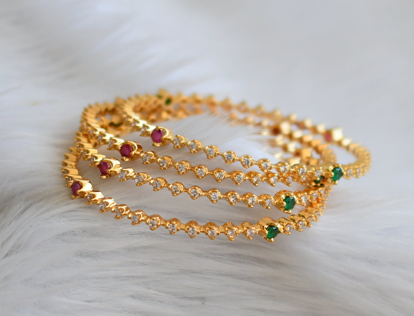 Gold tone cz ruby-green-white stone set of 4 bangles(2.4) dj-45141