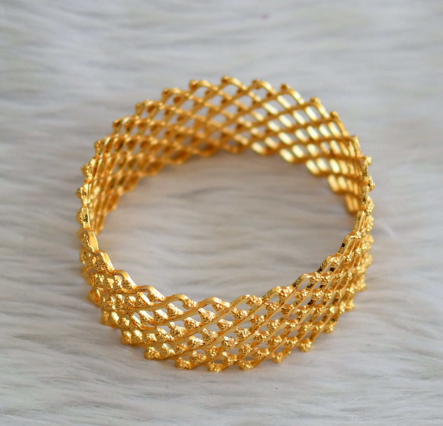 Gold tone kerala style zigzag bangle(2.4) dj-45152
