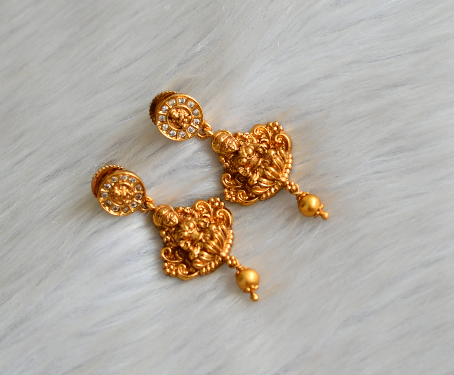 Matte finish white stone Lakshmi earrings dj-42244
