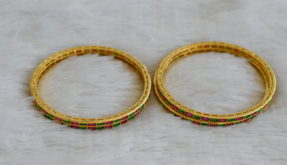 Gold tone set of 4 ruby-green bangles(2.6) dj-30538