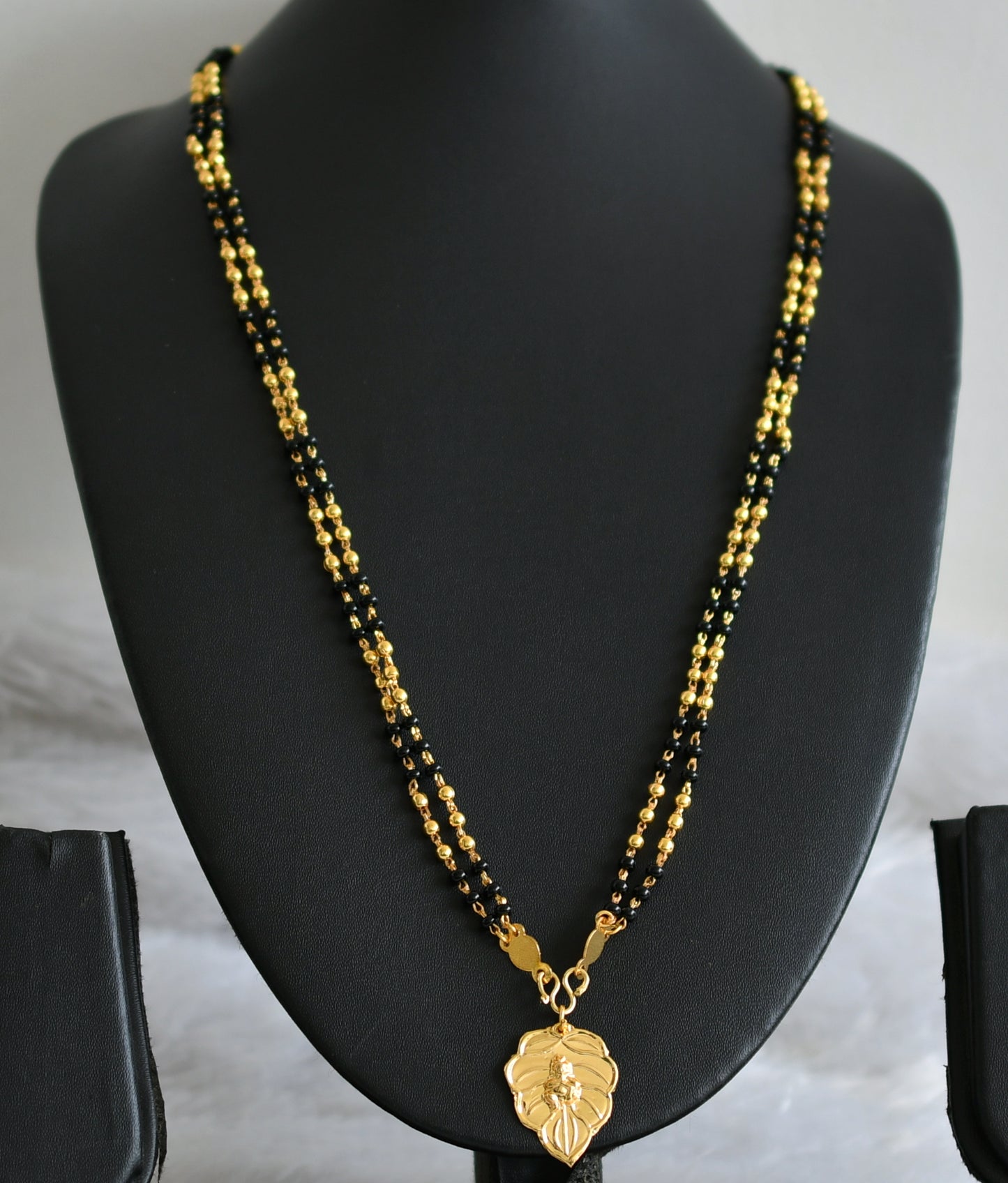 Gold tone black krishna pendant karimani mala/chain dj-36875