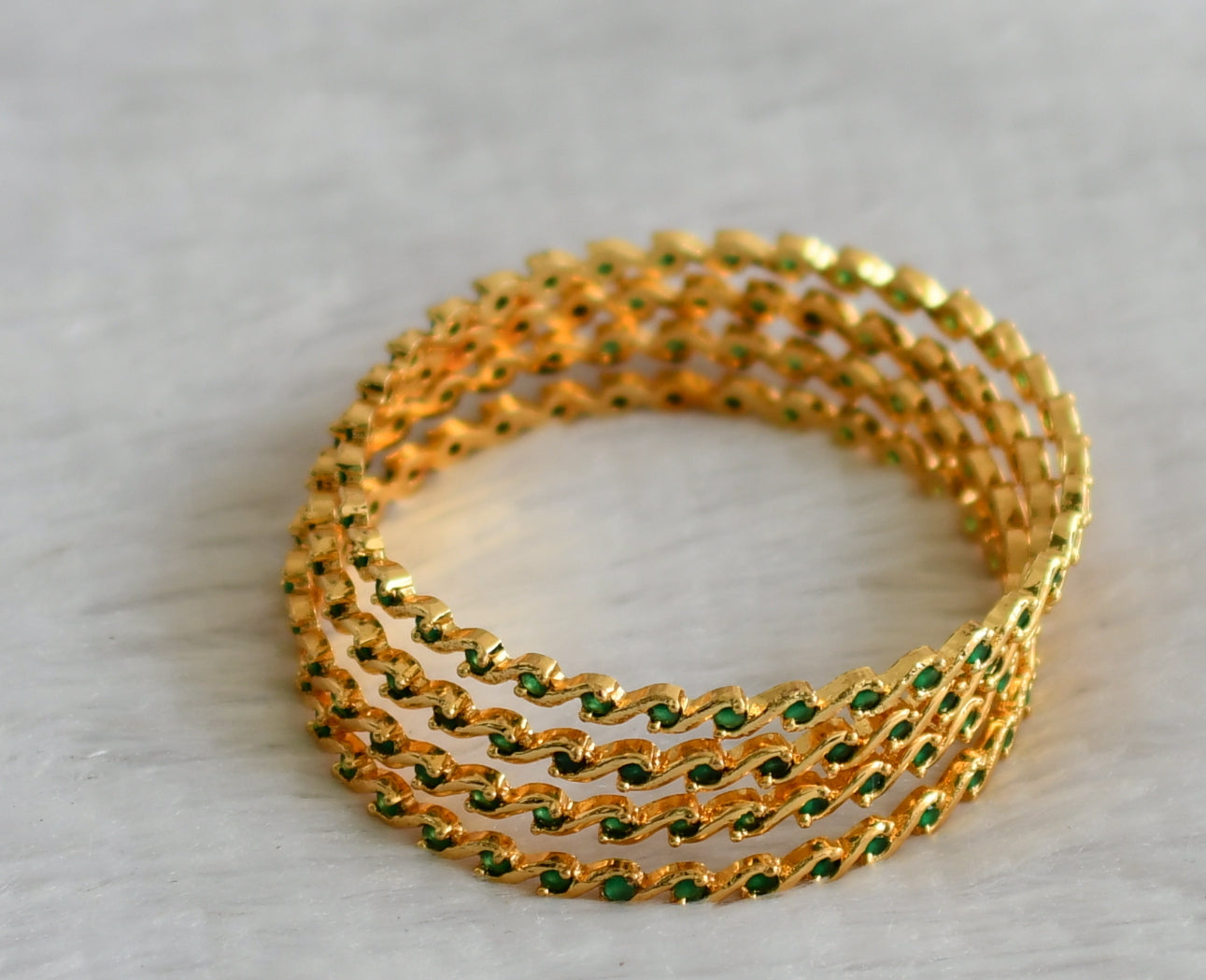 Gold tone emerald stone set of 4 bangles(2.4) dj-46903