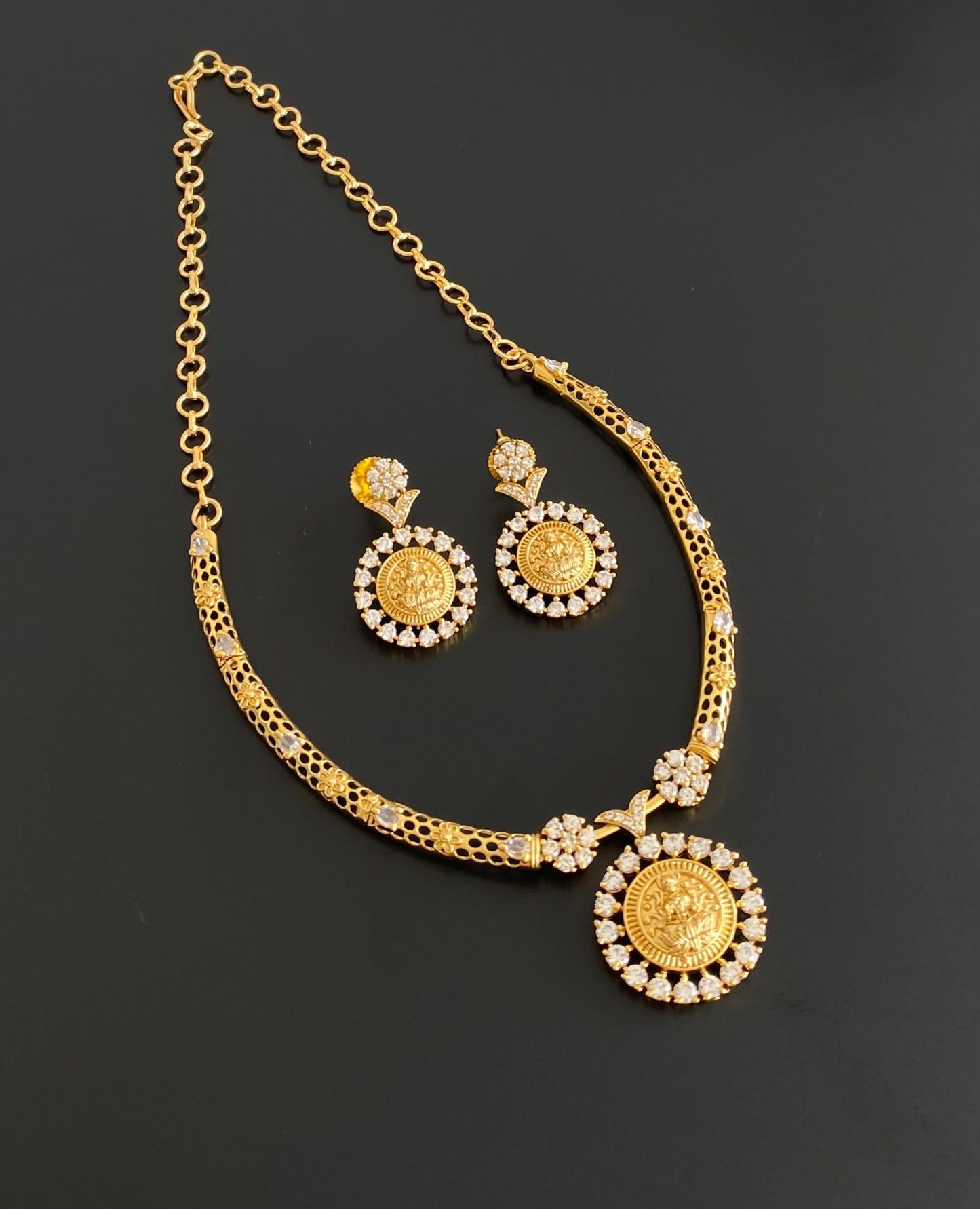 Gold tone white stone lakshmi necklace set dj-54353
